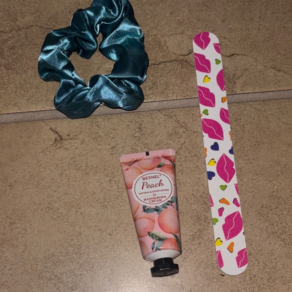 First Aid Beauty Skincare Collection with Teal Scrunchie nail file and cream bun - Picture 5 of 8